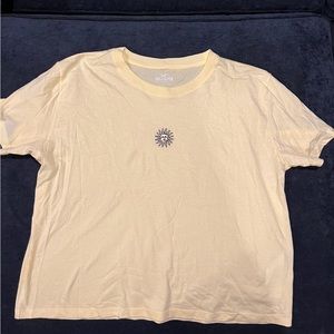 Brand new Hollister sun, light yellow tee, size large, never worn!